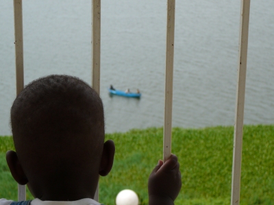 Judah Watches the Fishermen on Lake Victoria